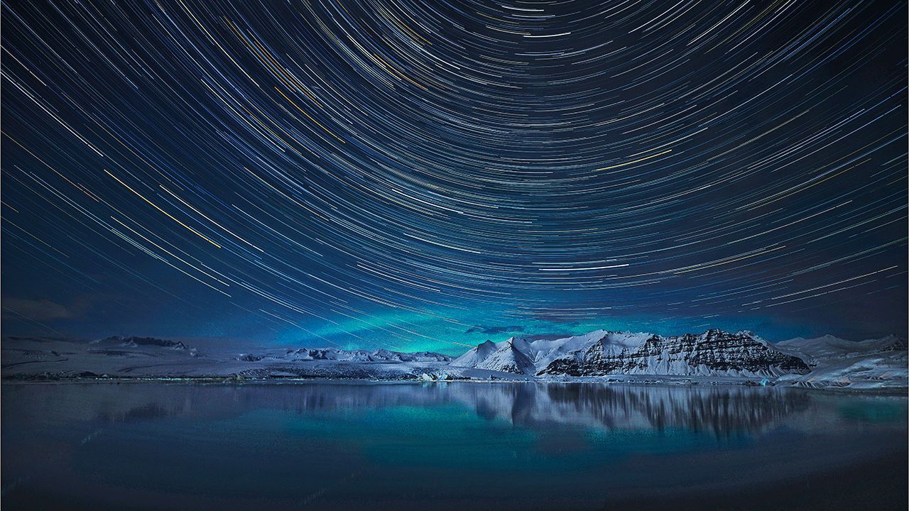 Aurora Borealis and star-trails.