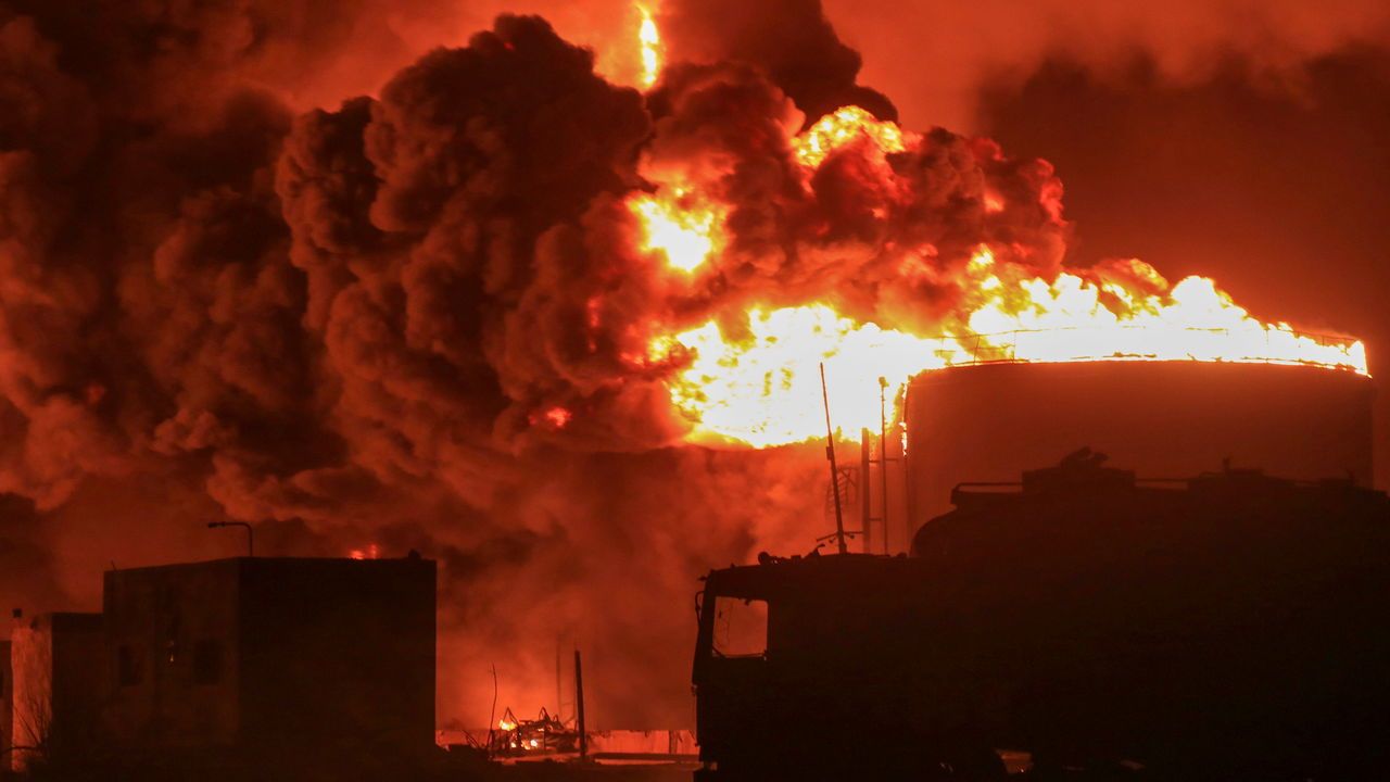 Oil tanks burn at the port in Hodeidah, Yemen, July 20th 2024