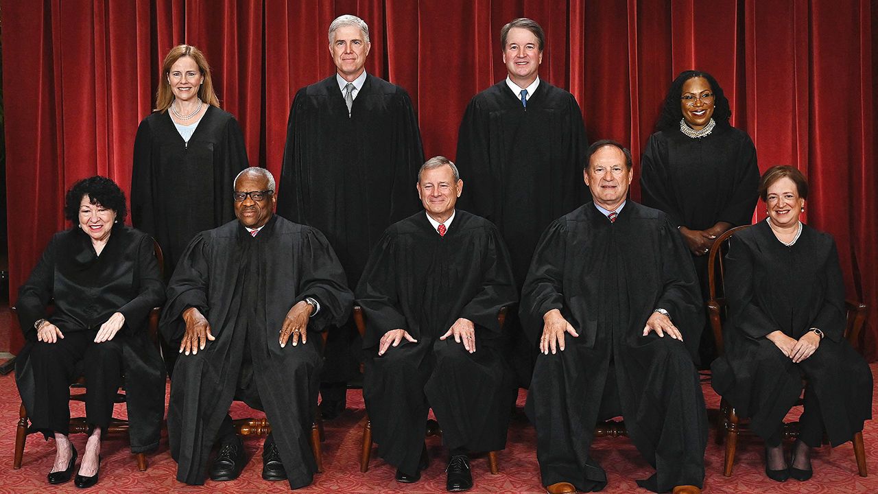 Justices of the US Supreme Court pose for their official photo at the Supreme Court in Washington, DC on October 7th 2022