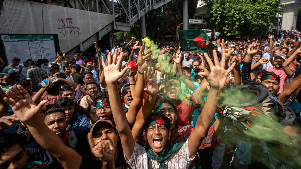 Protesters shout slogans as they celebrate Prime Minister Sheikh Hasina's resignation, in Dhaka, Bangladesh.